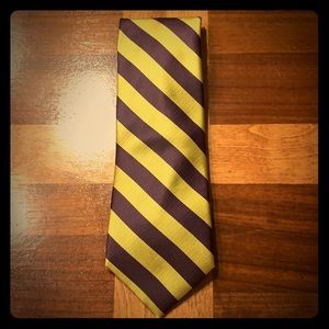 Purple and gold wolfmark tie